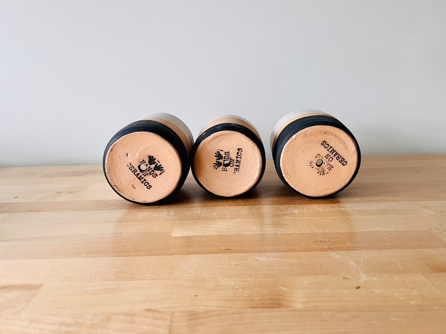 SECONDS- Cylinder planter pot with saucer. 4". black, beige and White. Ceramic. drain hole