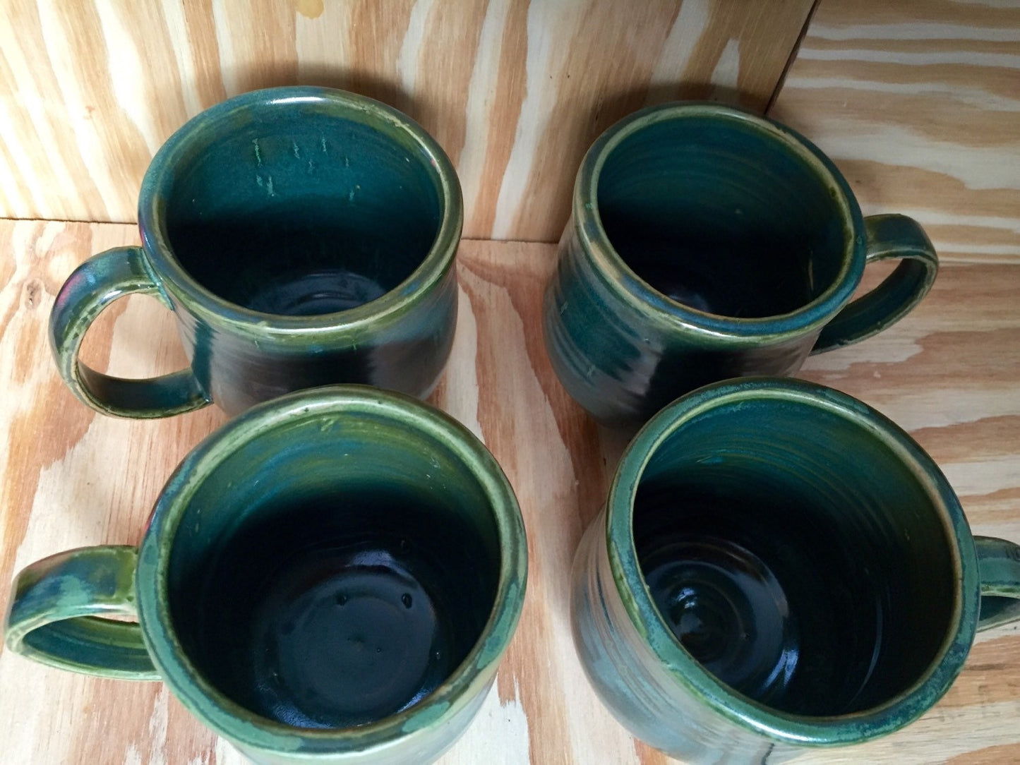 Handmade ceramic mugs in turquoise Set of four