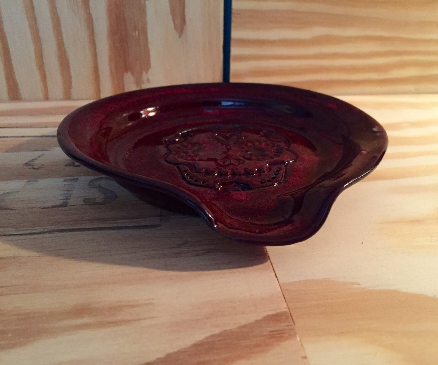 Handmade ceramic spoon rest in red