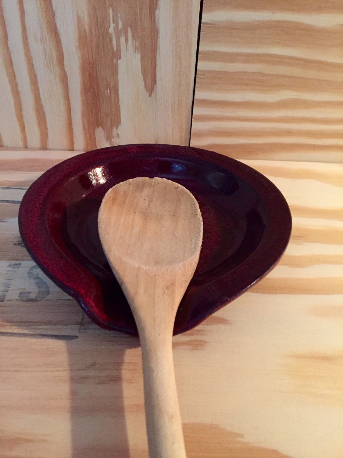 Keep calm and carry on" Handmade ceramic spoon rest in red