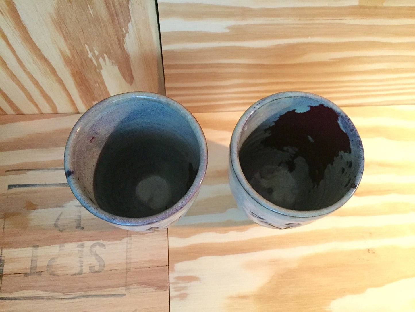 Handmade ceramic pint mugs in blue in handcarved arrow design (set of two)