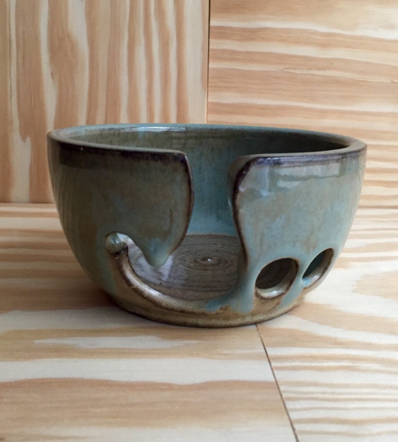 Small Handemade ceramic yarn bowl in almond and blue