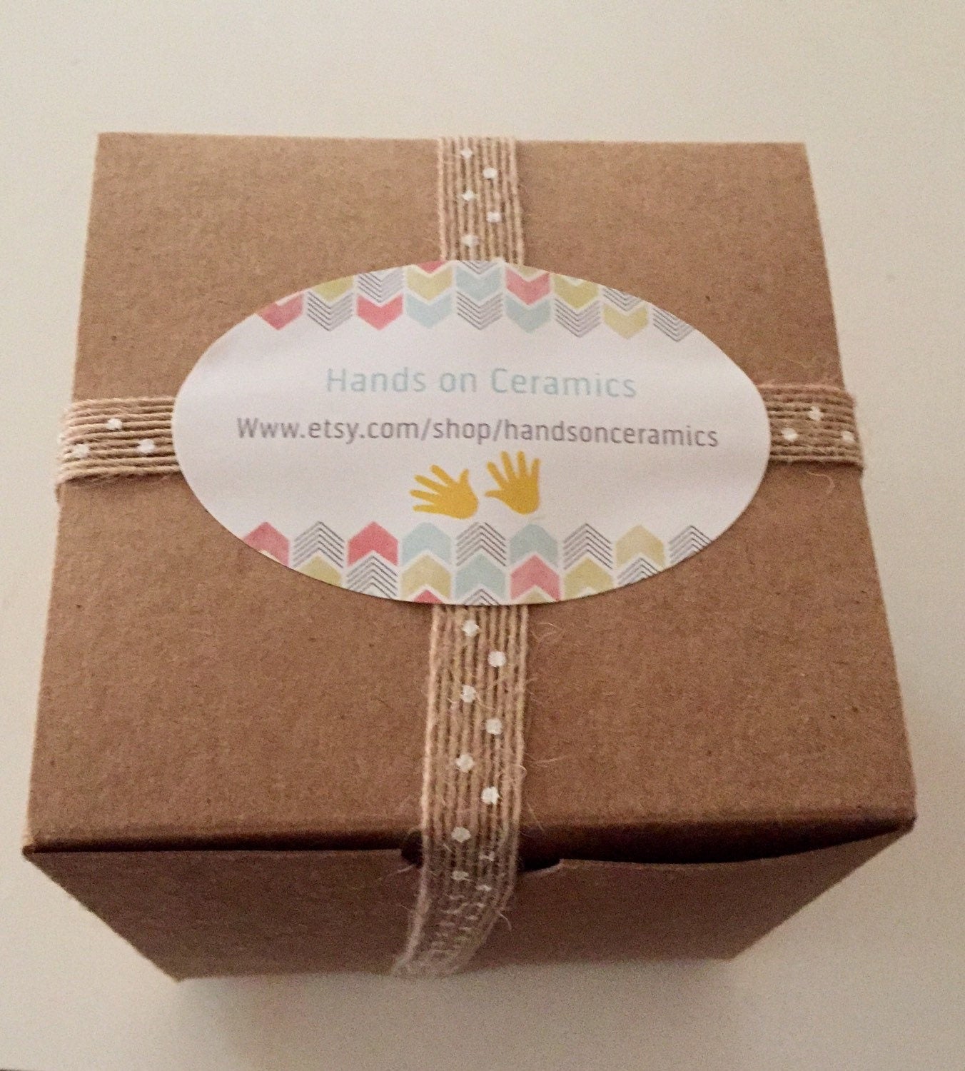 Vanilla scented candles in handmade ceramic jar