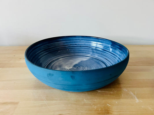 limited edition. serving bowls and blates. custom blue. handemade ceramics