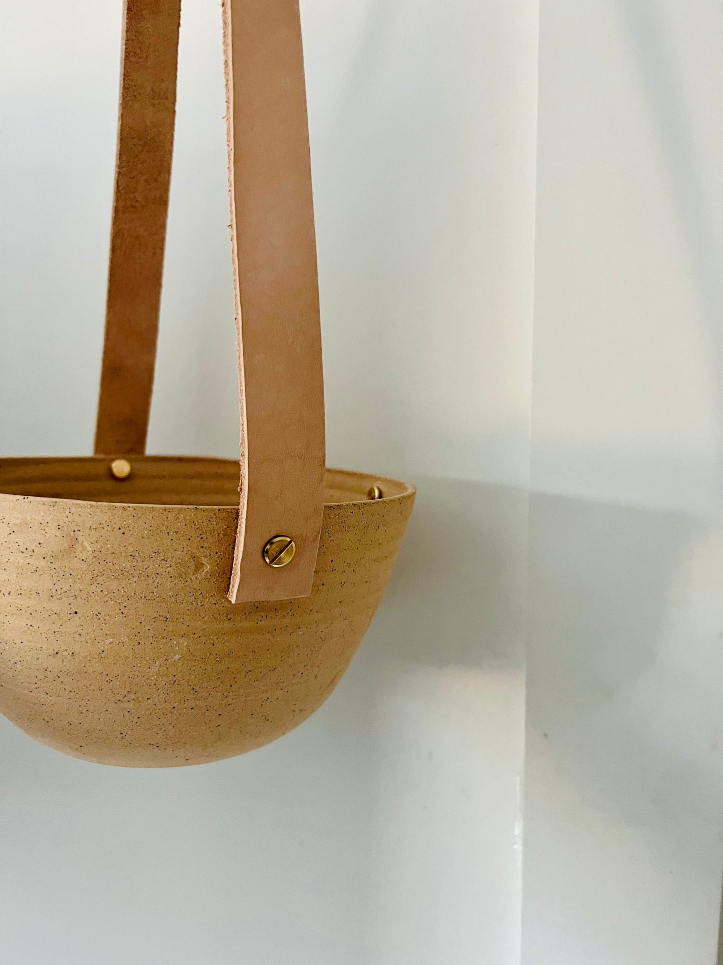 limited edition -western style hanging planter. Natural. leather and brass- Handemade ceramics.