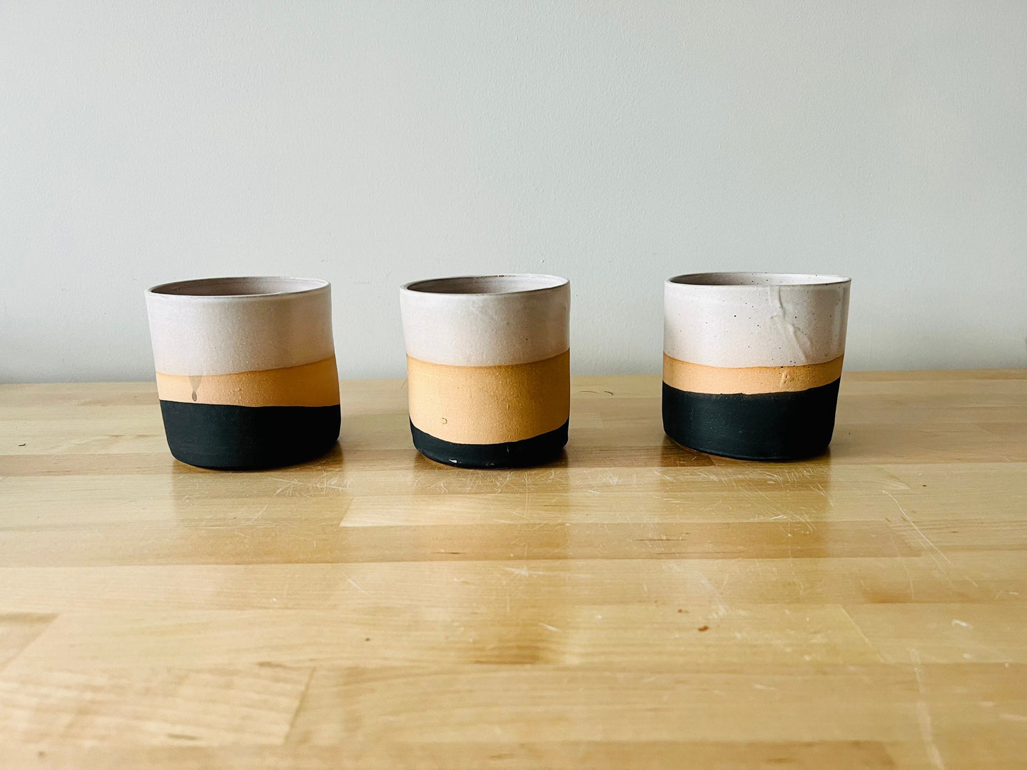 SECONDS- Cylinder planter pot with saucer. 4". black, beige and White. Ceramic. drain hole