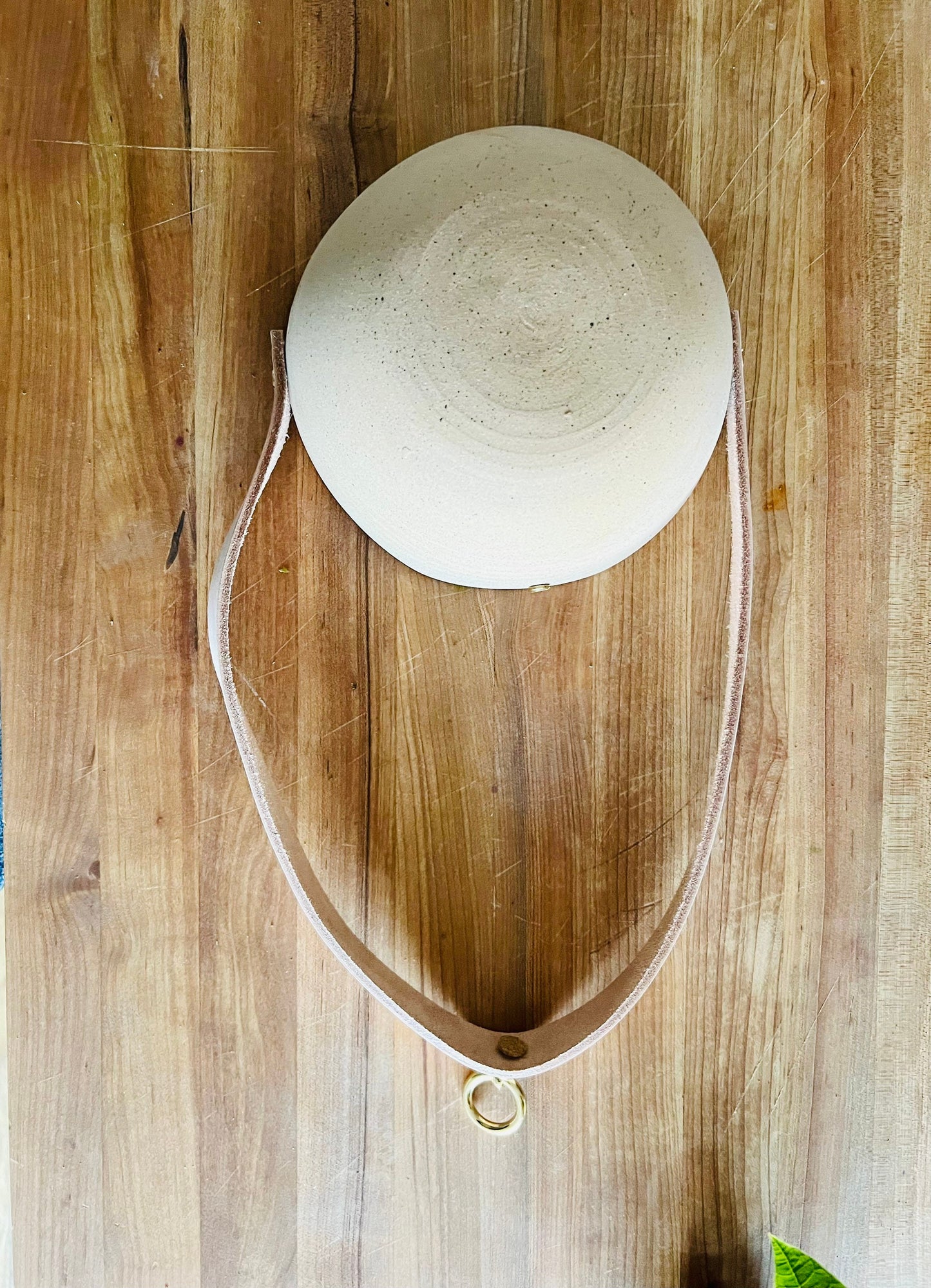 limited edition -western style hanging planter. Natural. leather and brass- Handemade ceramics.