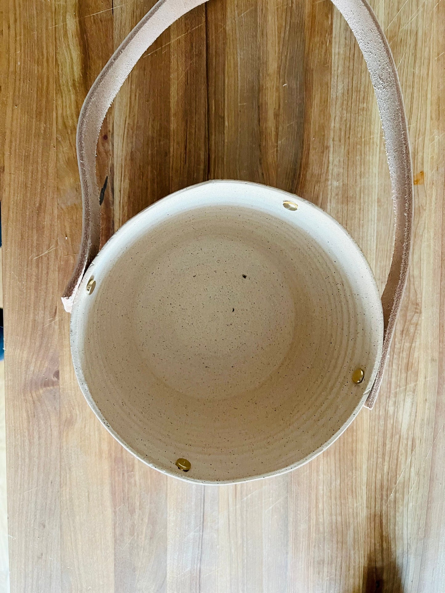 limited edition -western style hanging planter. Natural. leather and brass- Handemade ceramics.