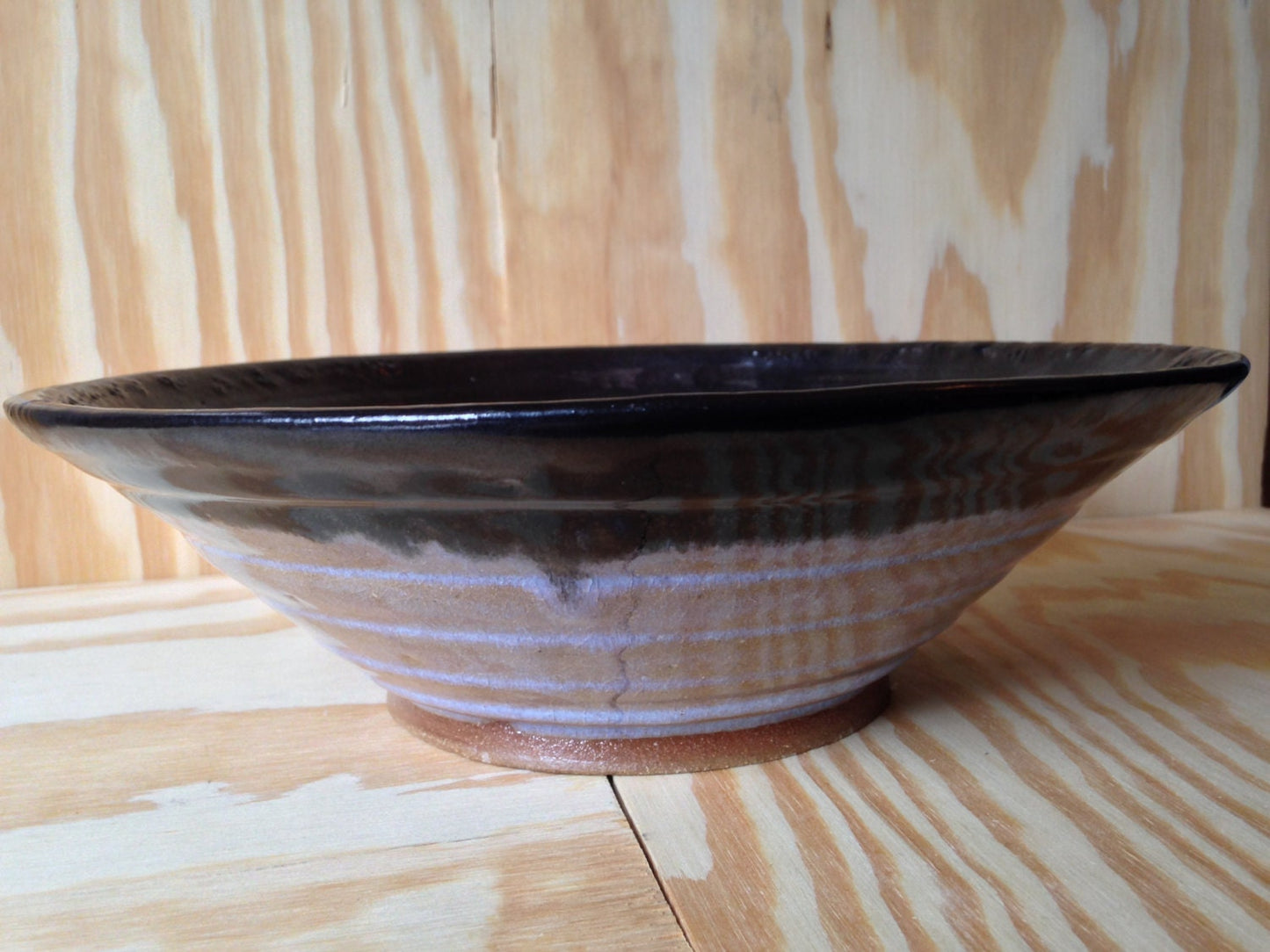 Large wide black metallic and clear glaze bowl