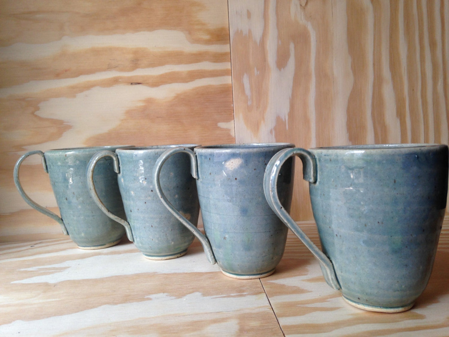 Hand thrown 4 piece coffee mug set in turquoise green