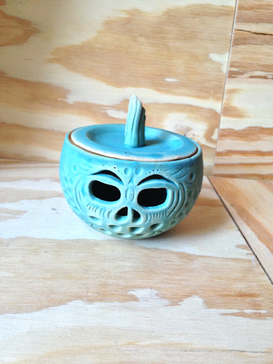 unique turqouise scented wax melter jar with hand carved pumpkin design