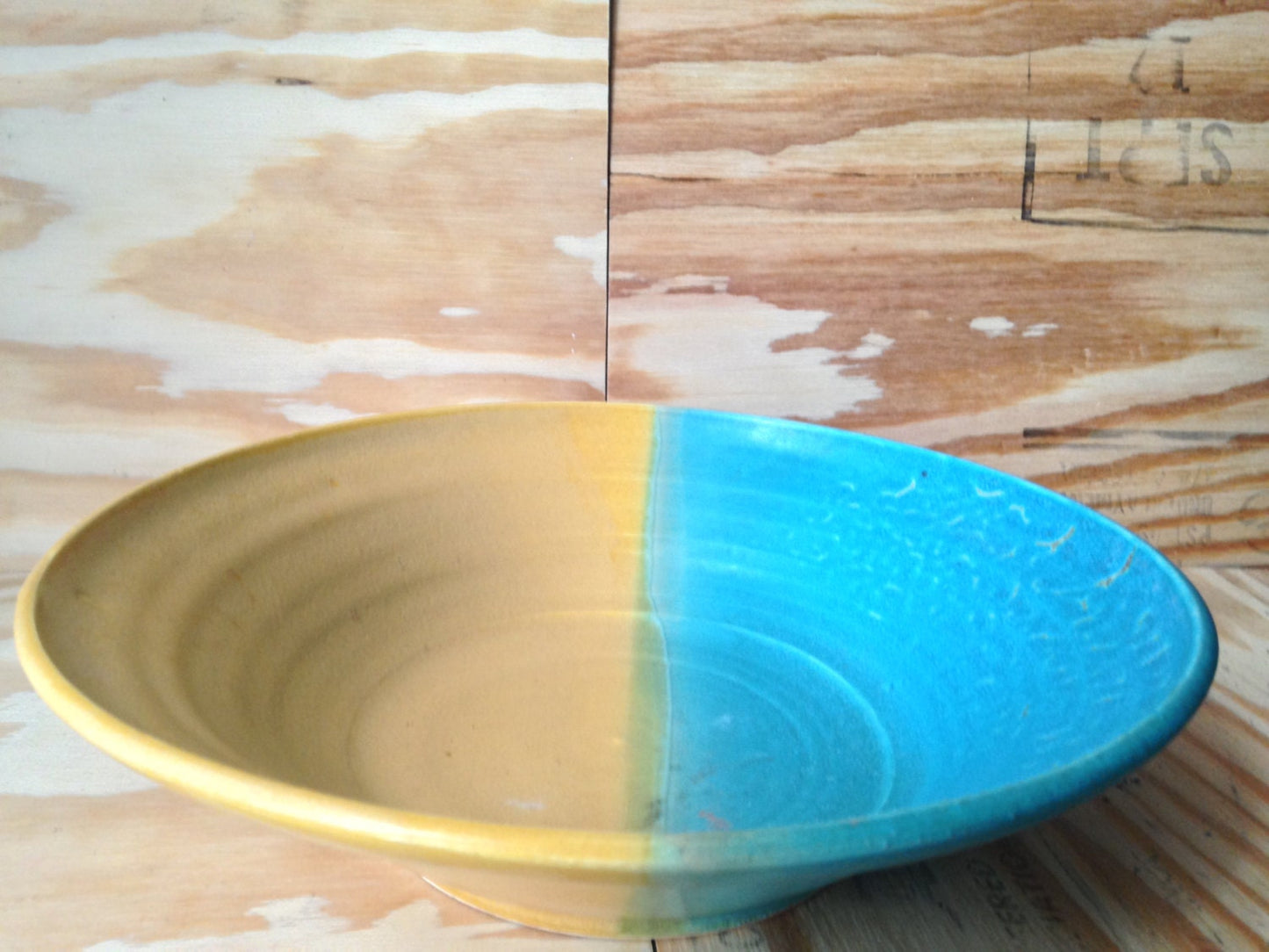 large wide shallow turqouise and yellow multipurpose bowl