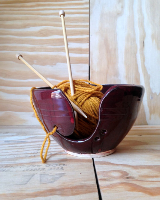 red handcrafted functional knitting yarn bowl with hand cut pattern