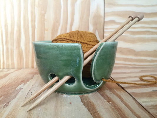 Hand crafted green ceramic knitting yarn bowl with hand cut pattern