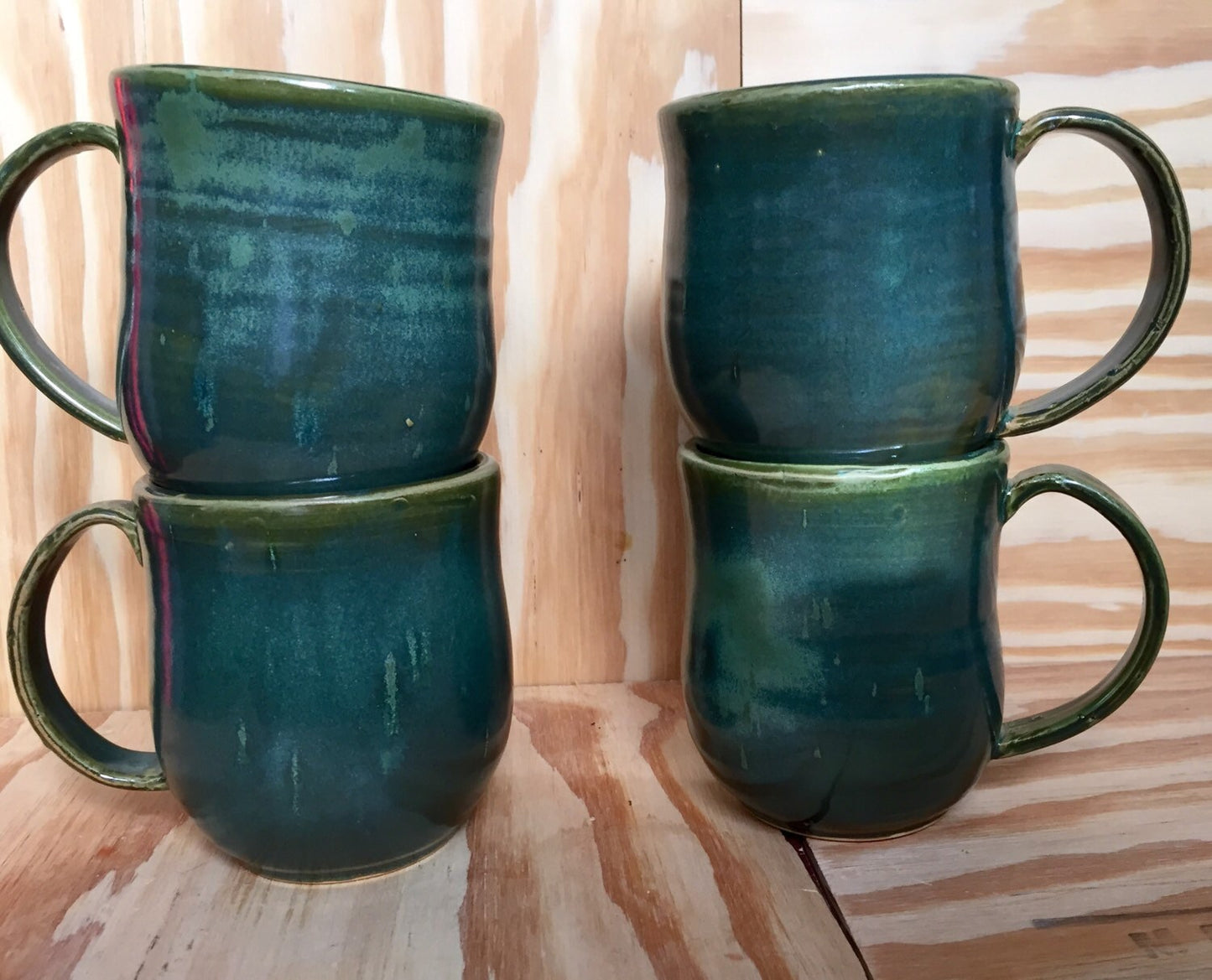 Handmade ceramic mugs in turquoise     Set of four
