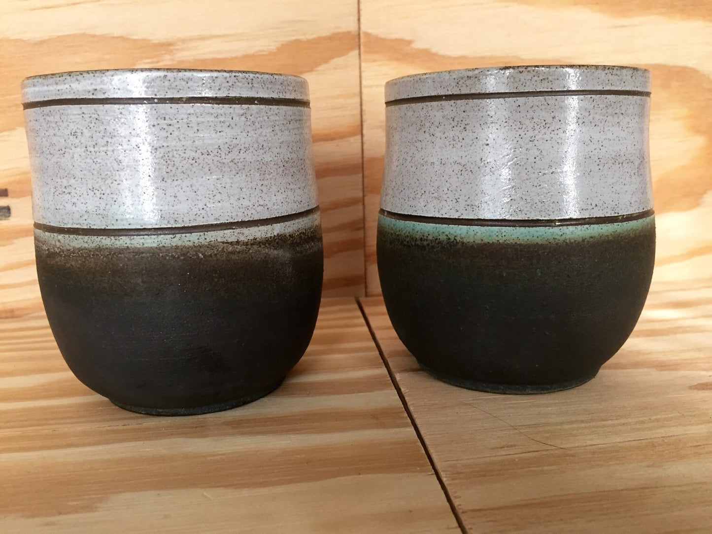 Hand made ceramic  coffee mugs white and black with sgrafitto design or plain  set of two
