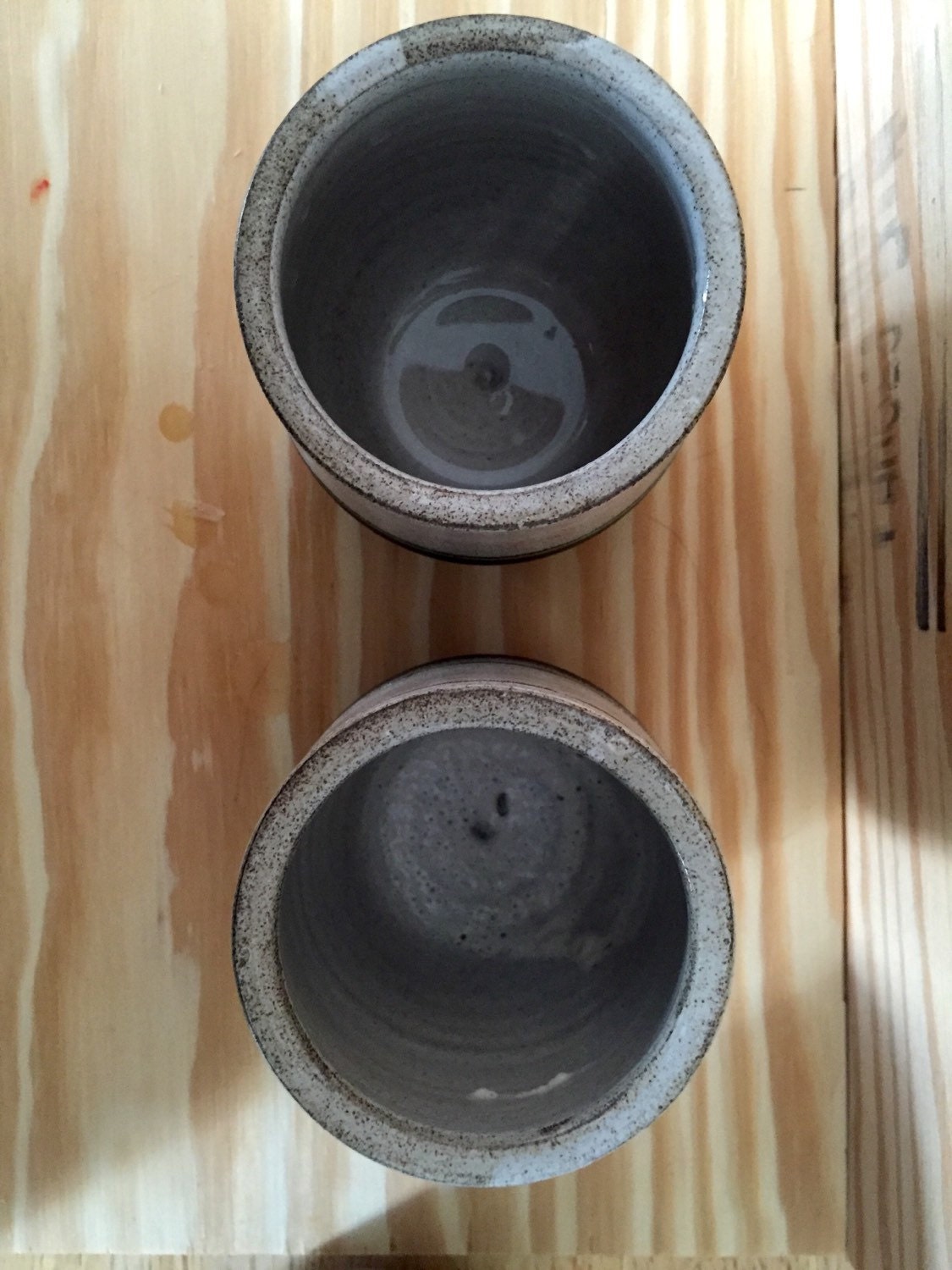 Hand made ceramic  coffee mugs white and black with sgrafitto design or plain  set of two