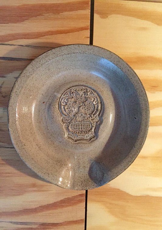 White handmade ceramic spoon rest with sugarskull design