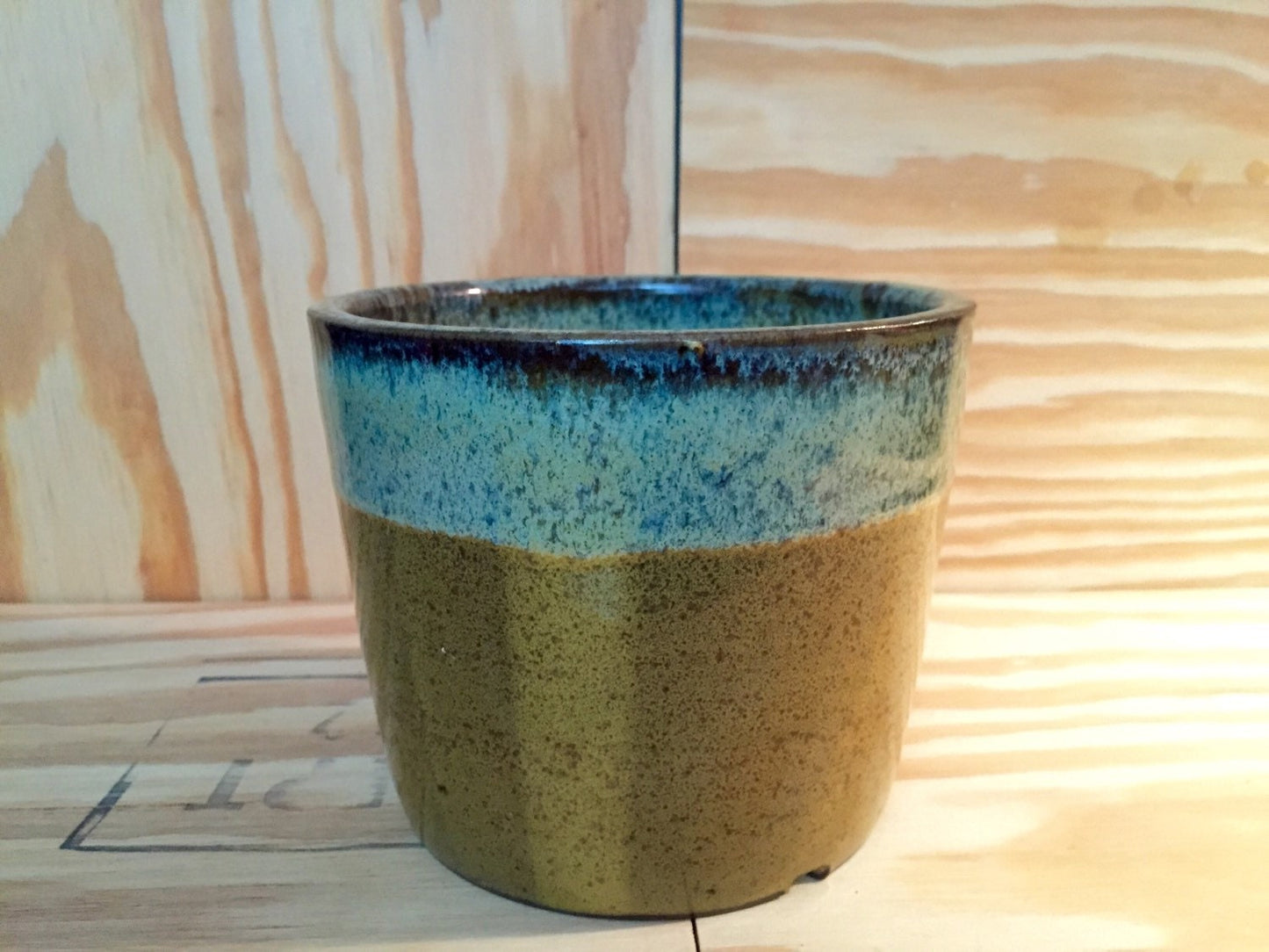 Medium sized handmade ceramic outdoor planter in chestnut and blue glaze