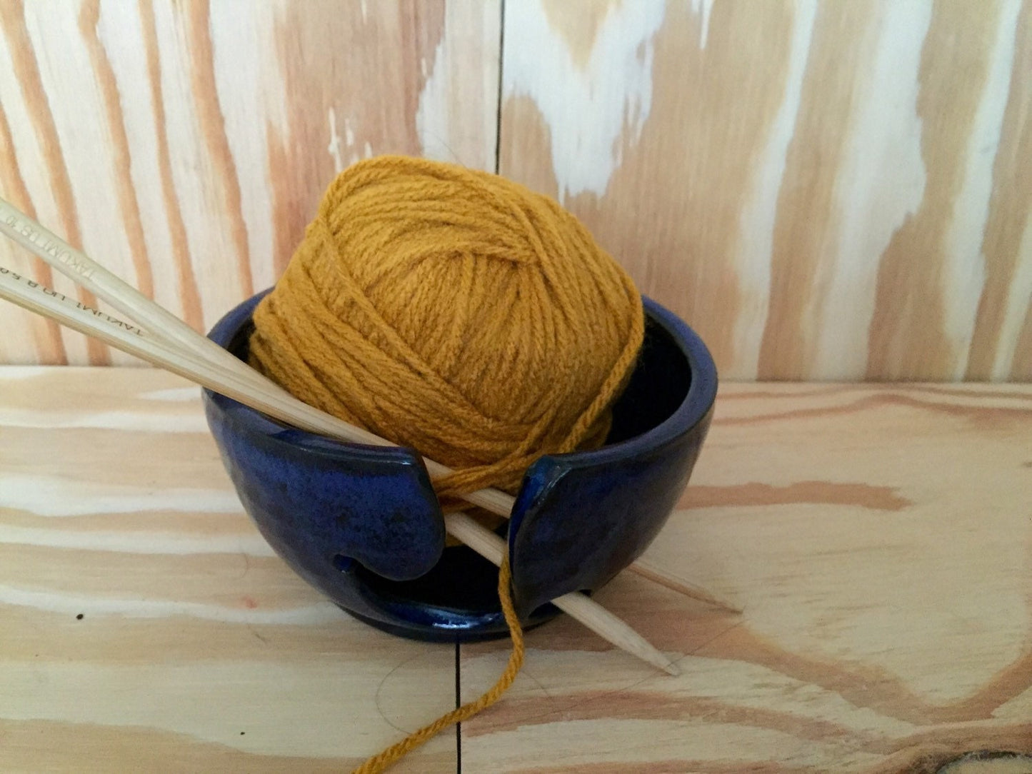 Small handemade ceramic yarn knitting bowl in dark blue