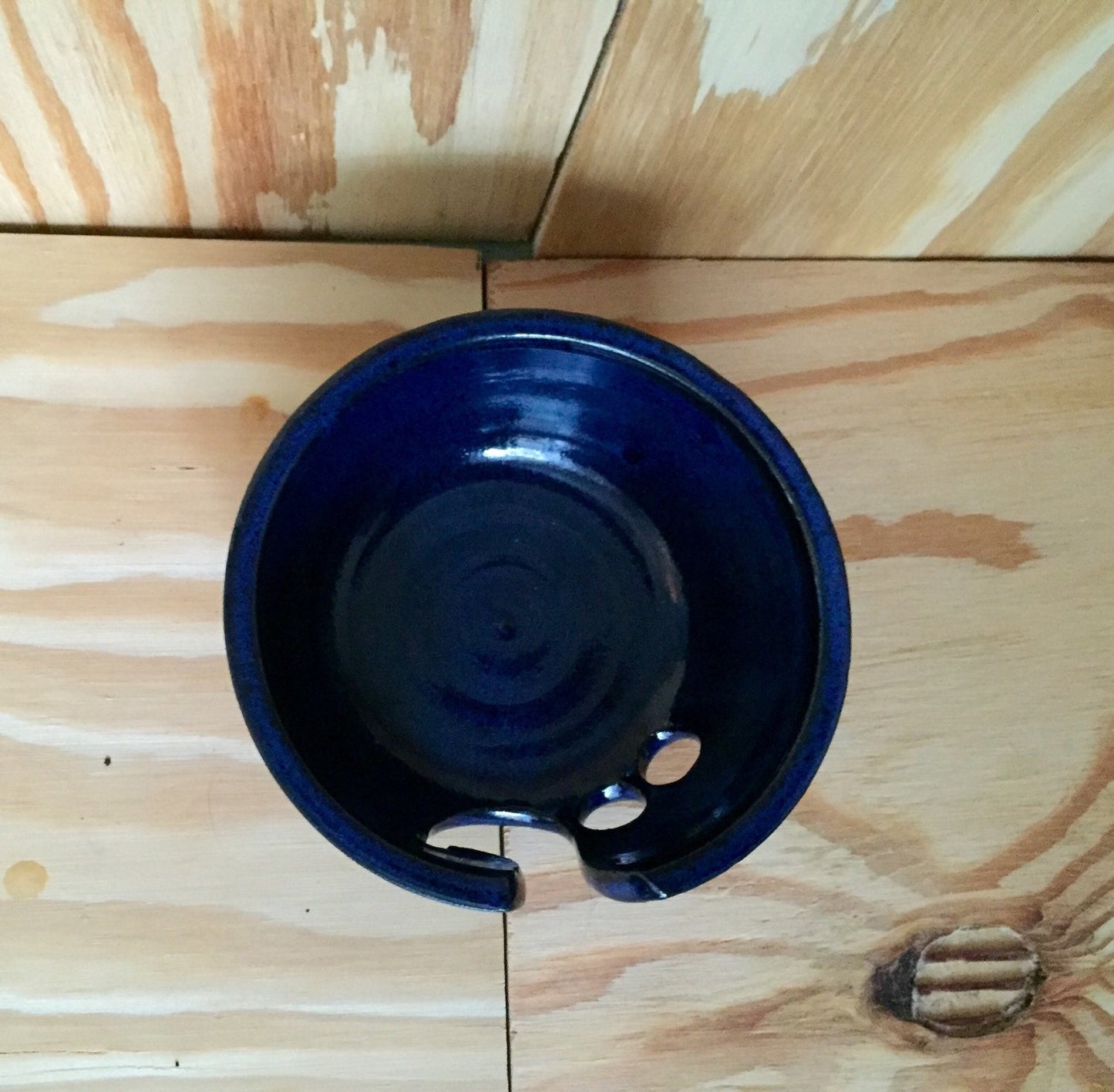 Small handemade ceramic yarn knitting bowl in dark blue