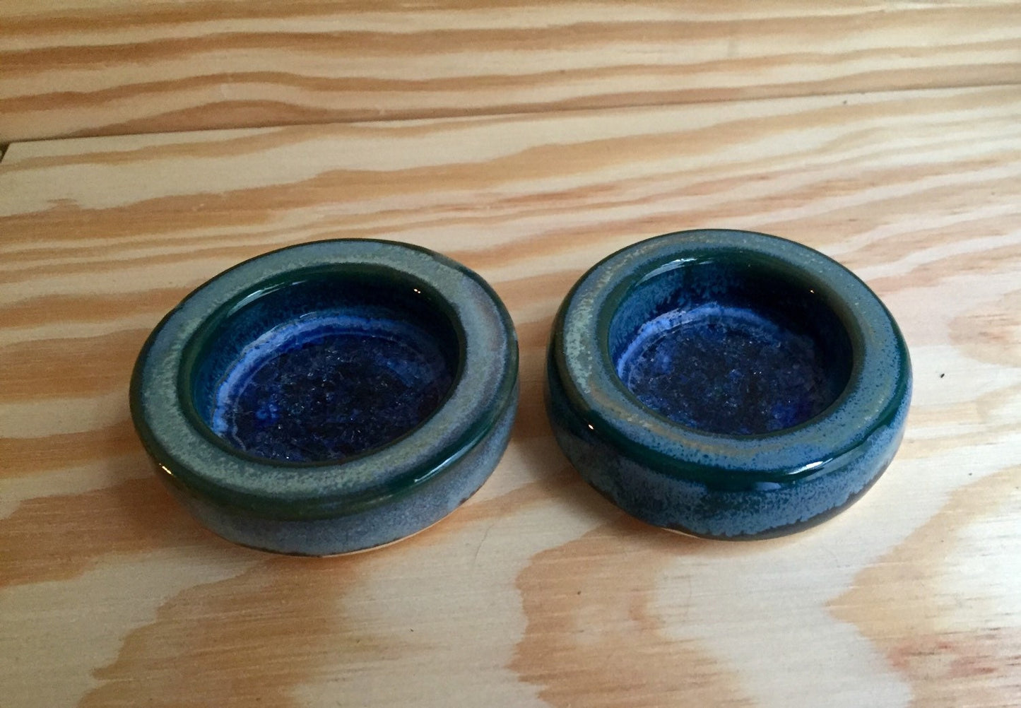 Set of two handmade candle/ tealight holder in blue with melted glass