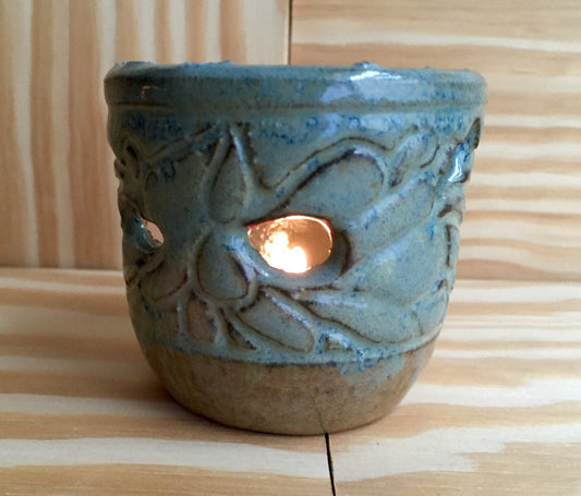 Handemade ceramic candle/tealight holder in blue and almond with melted glass
