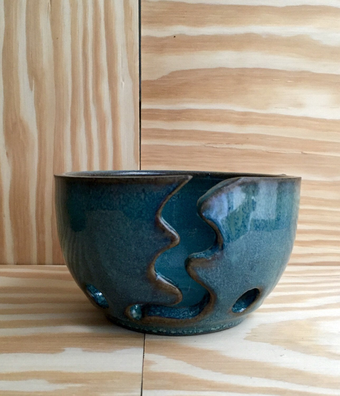 Small Handemade ceramic yarn-bowl in turquoise blue