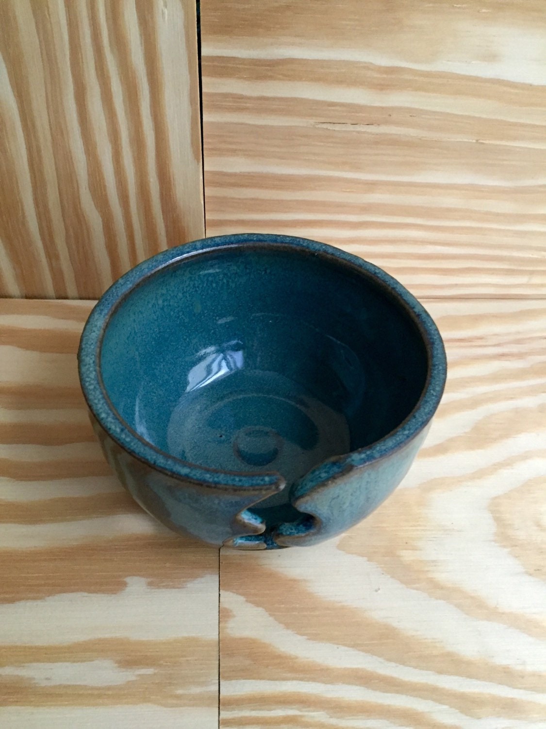 Small Handemade ceramic yarn-bowl in turquoise blue
