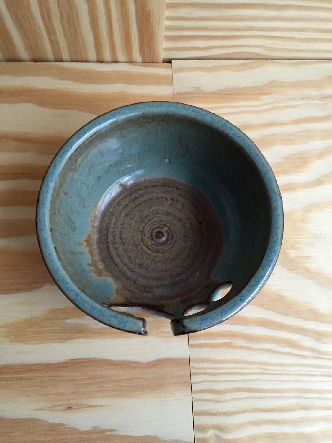 Small Handemade ceramic yarn bowl in almond and blue