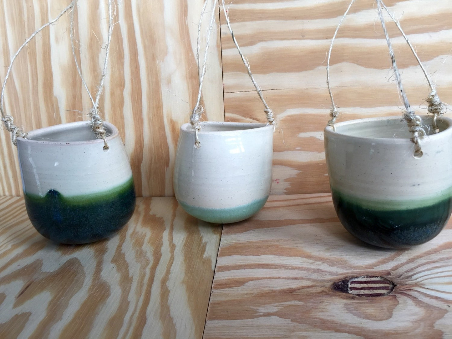 Bright baby blue Ceramic outdoor hanging flower or herb planters in with twine