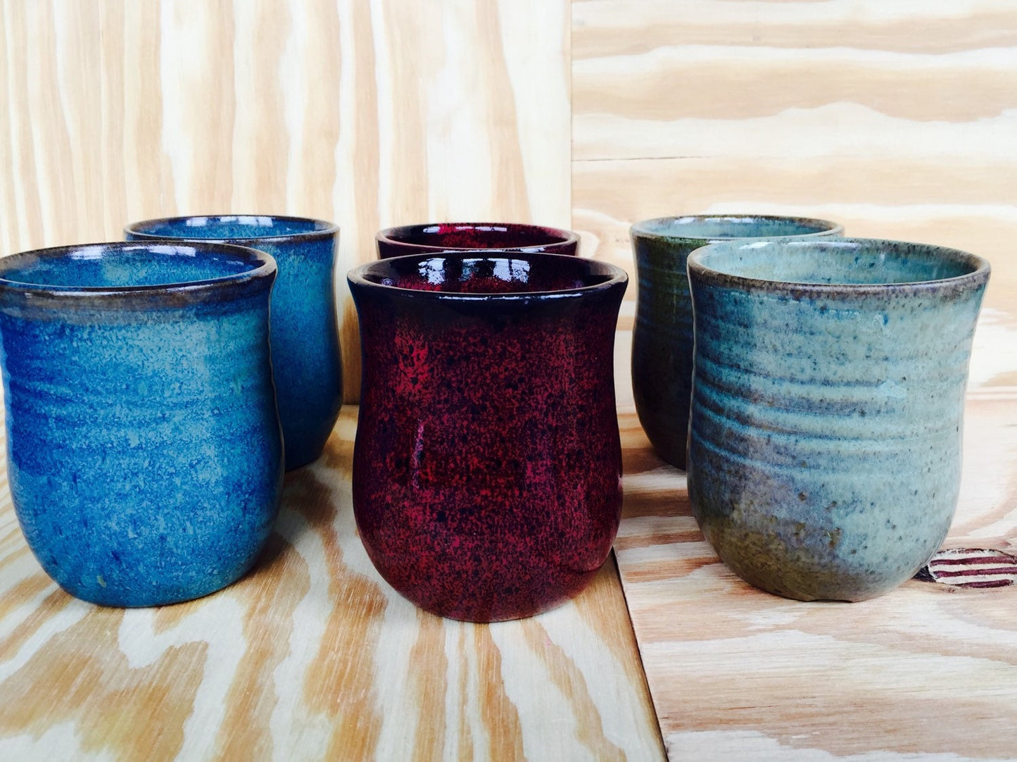 Handmade tulip shaped ceramic mug set of two in rich blue