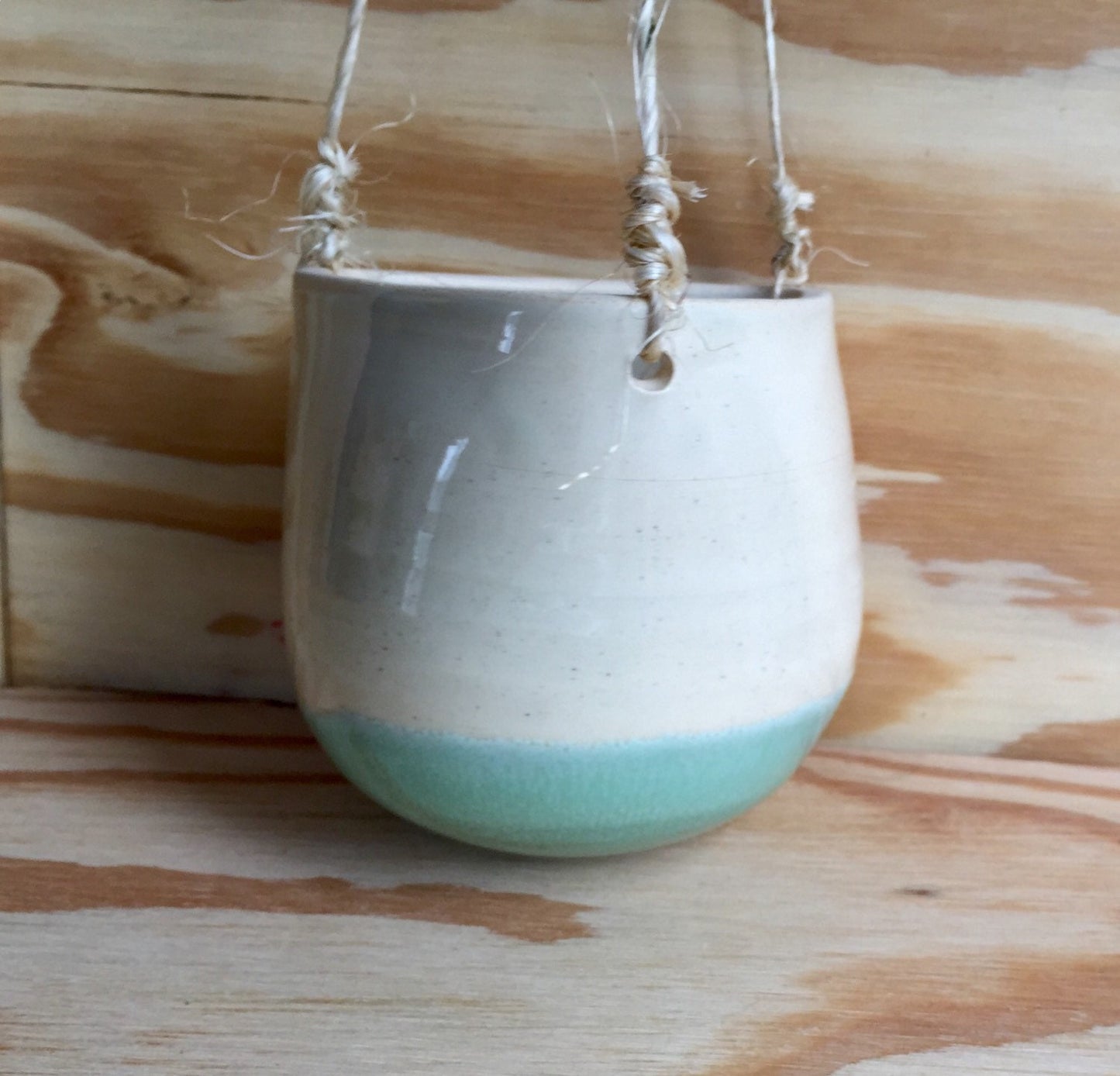 Bright baby blue Ceramic outdoor hanging flower or herb planters in with twine