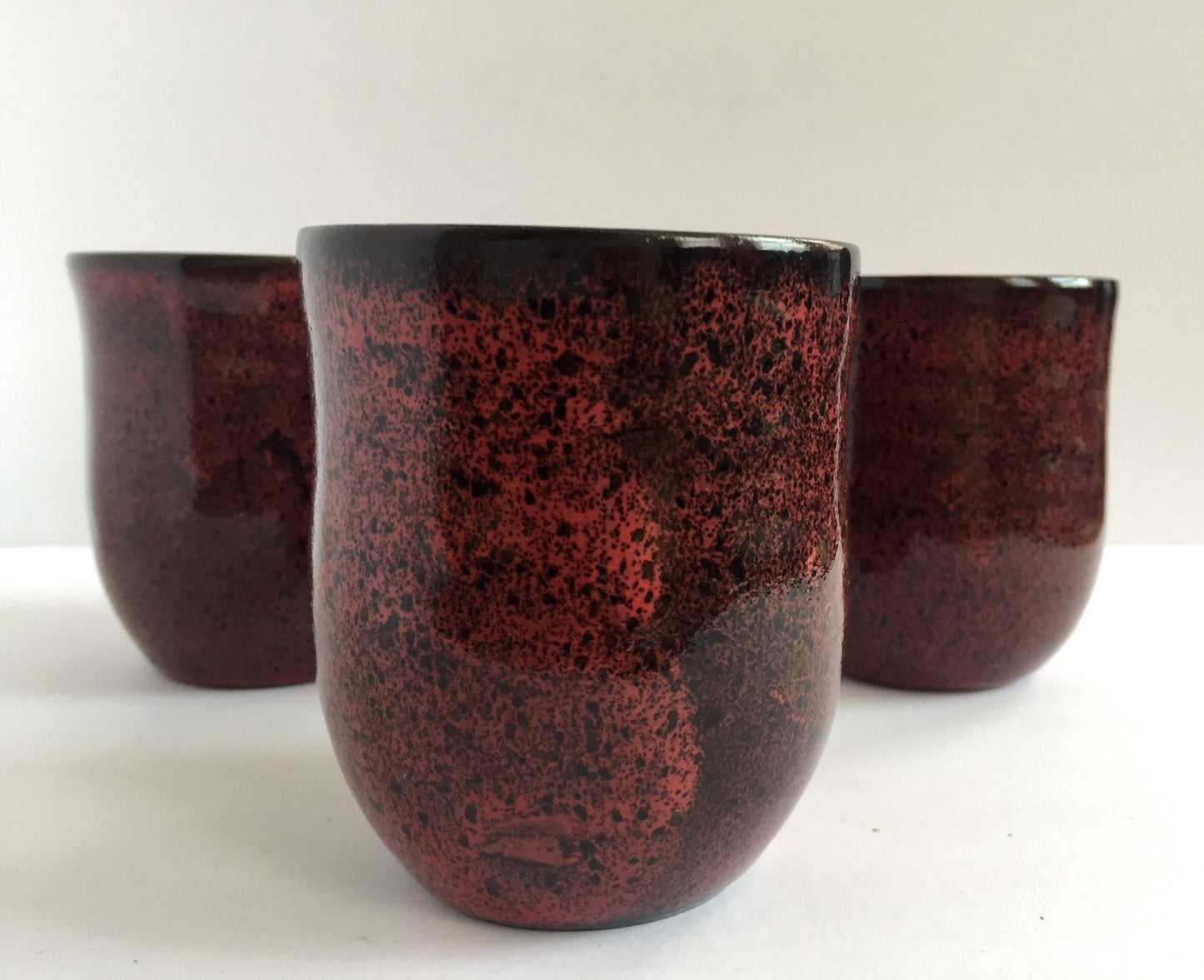 ceramic mug in deep burgandy red