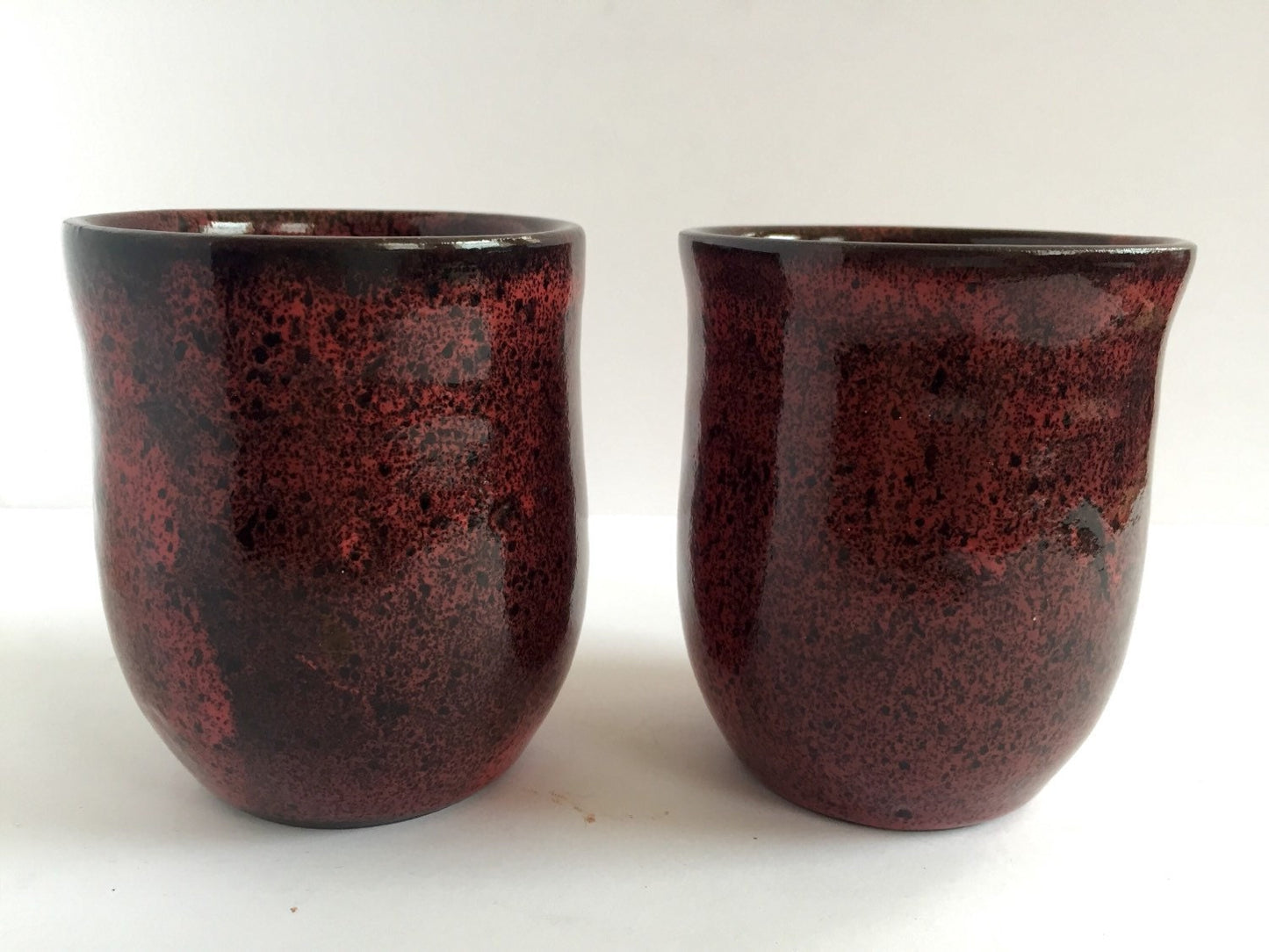 ceramic mug in deep burgandy red