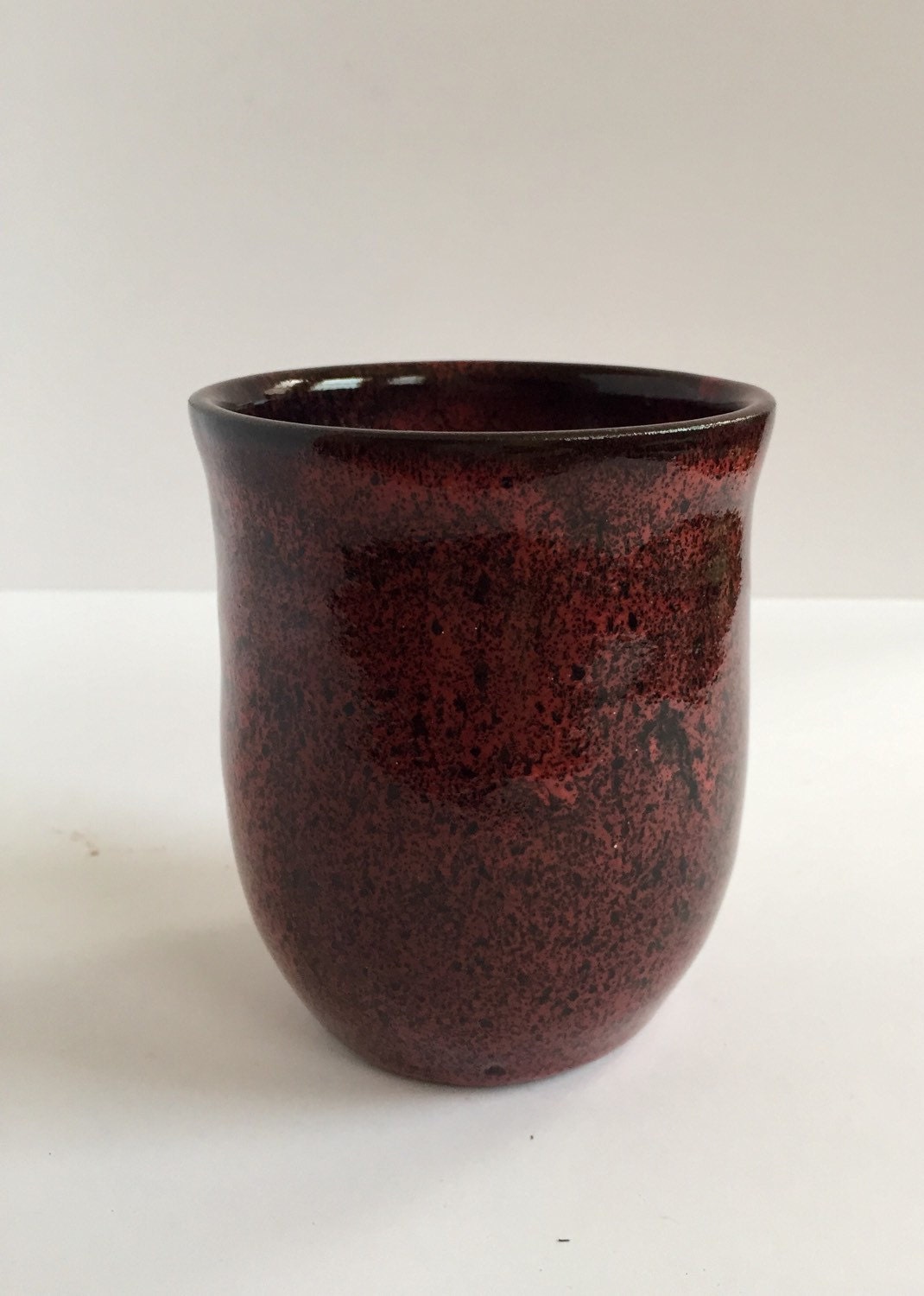 ceramic mug in deep burgandy red