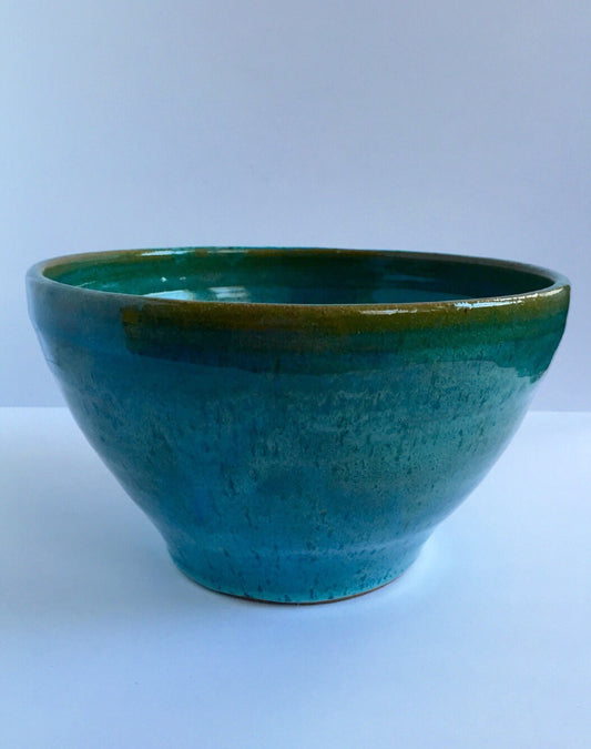 Large ceramic serving bowl in Turqiouse blue.