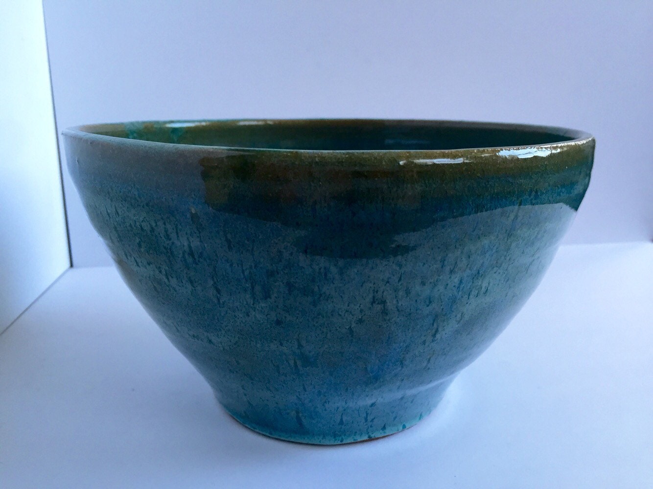 Large ceramic serving bowl in Turqiouse blue.