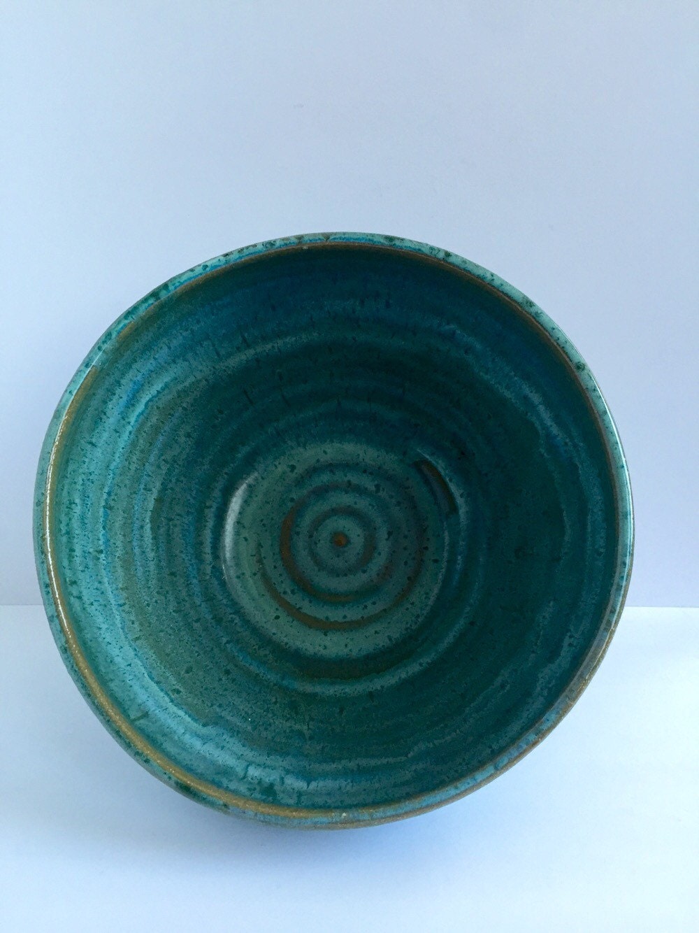 Large ceramic serving bowl in Turqiouse blue.