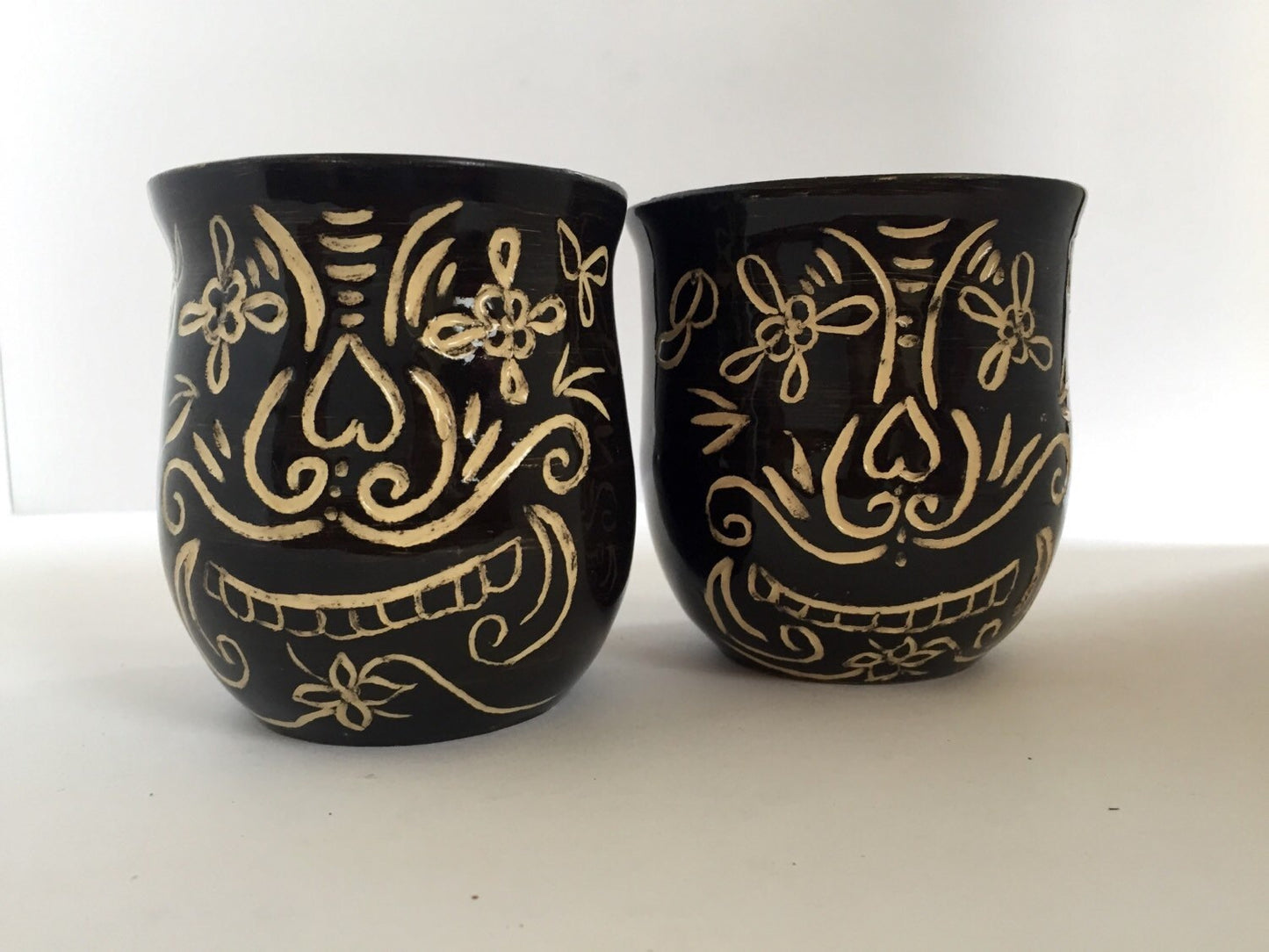 Sugar skull black ceramic coffee mugs with sgrafitto design  set of two.