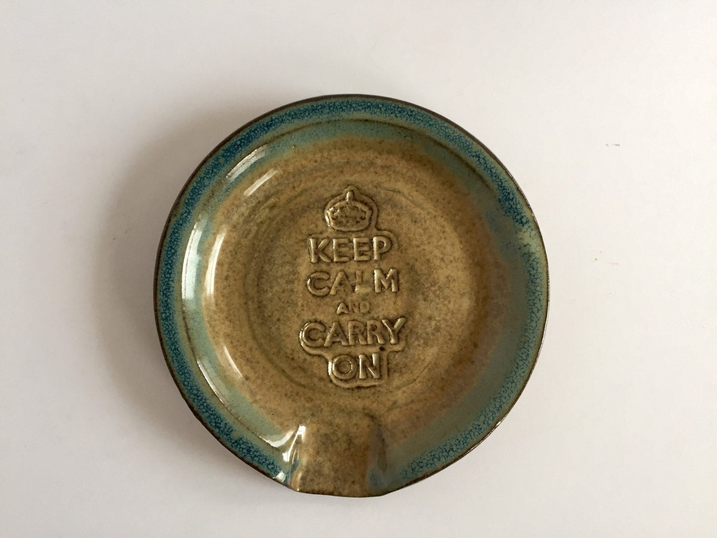 Keep calm and carry on" inspired handmade ceramic spoon rest in almond and teal