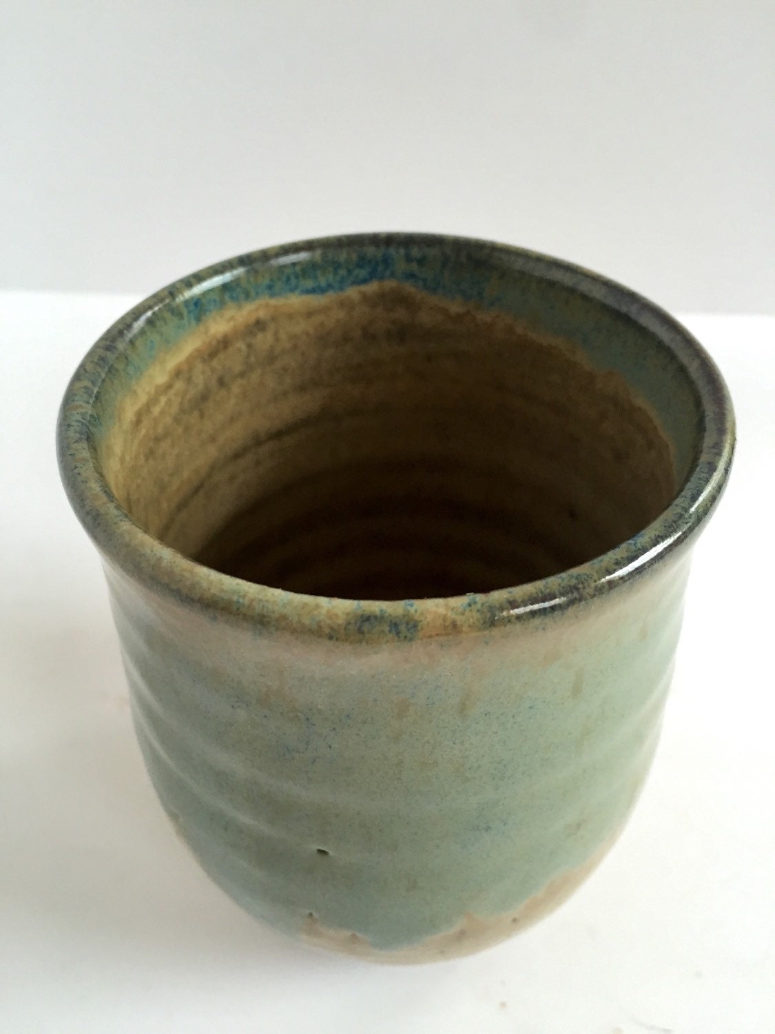 ceramic mug in almond and blue