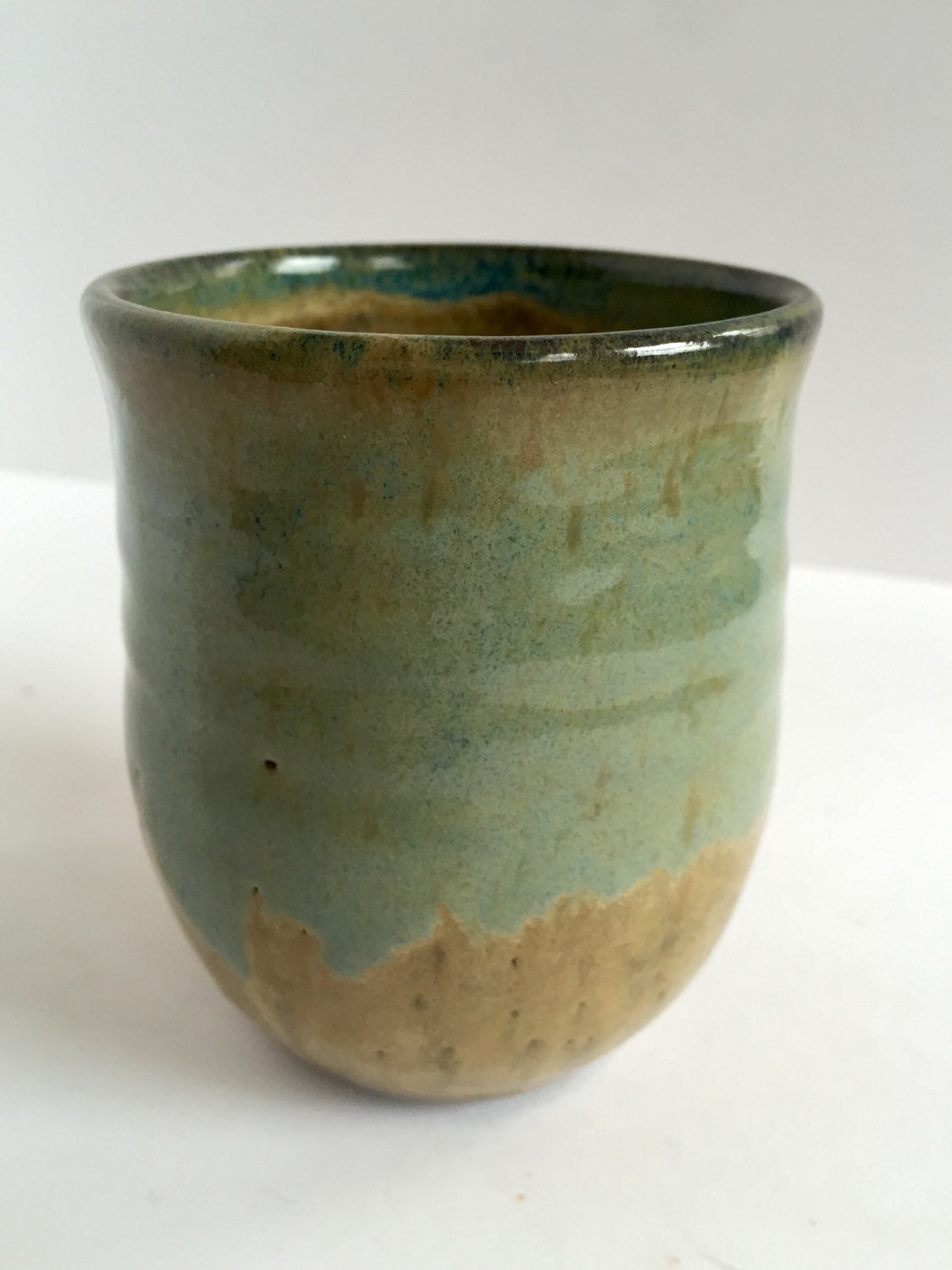 ceramic mug in almond and blue