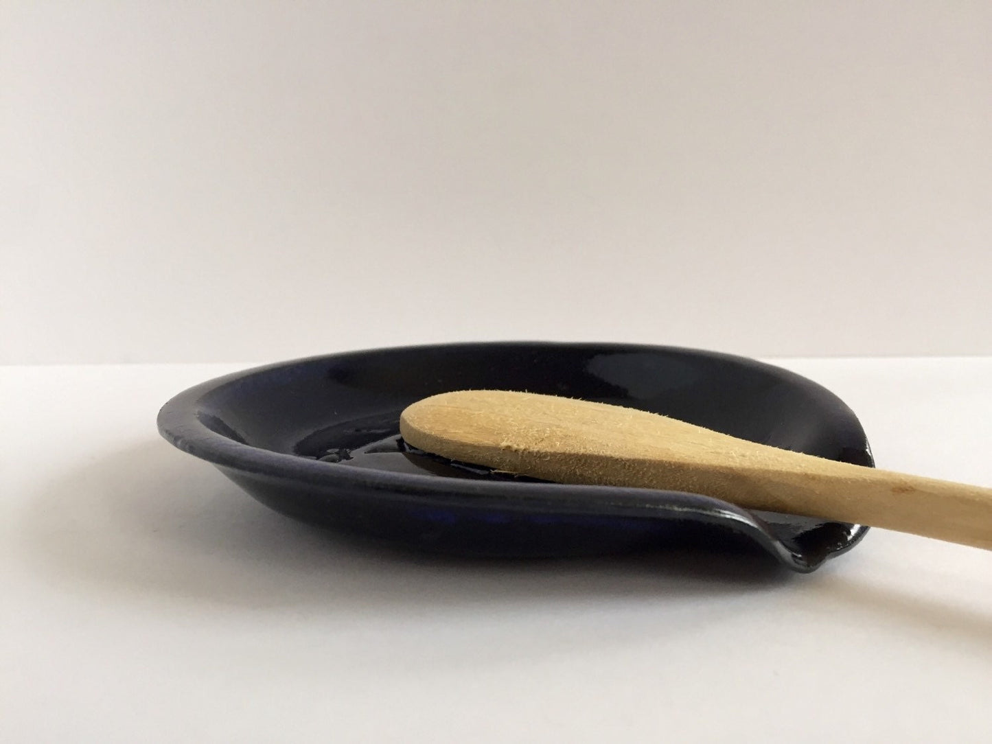 Mom inspired handemade ceramic spoon rest in dark blue