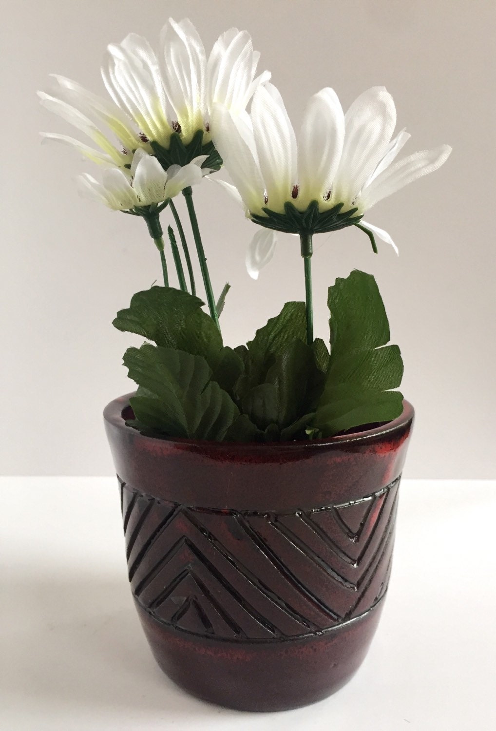 Hand carved  ceramic outdoor planter for 4" plants in burgandy