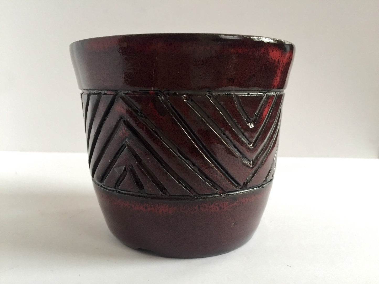 Hand carved  ceramic outdoor planter for 4" plants in burgandy