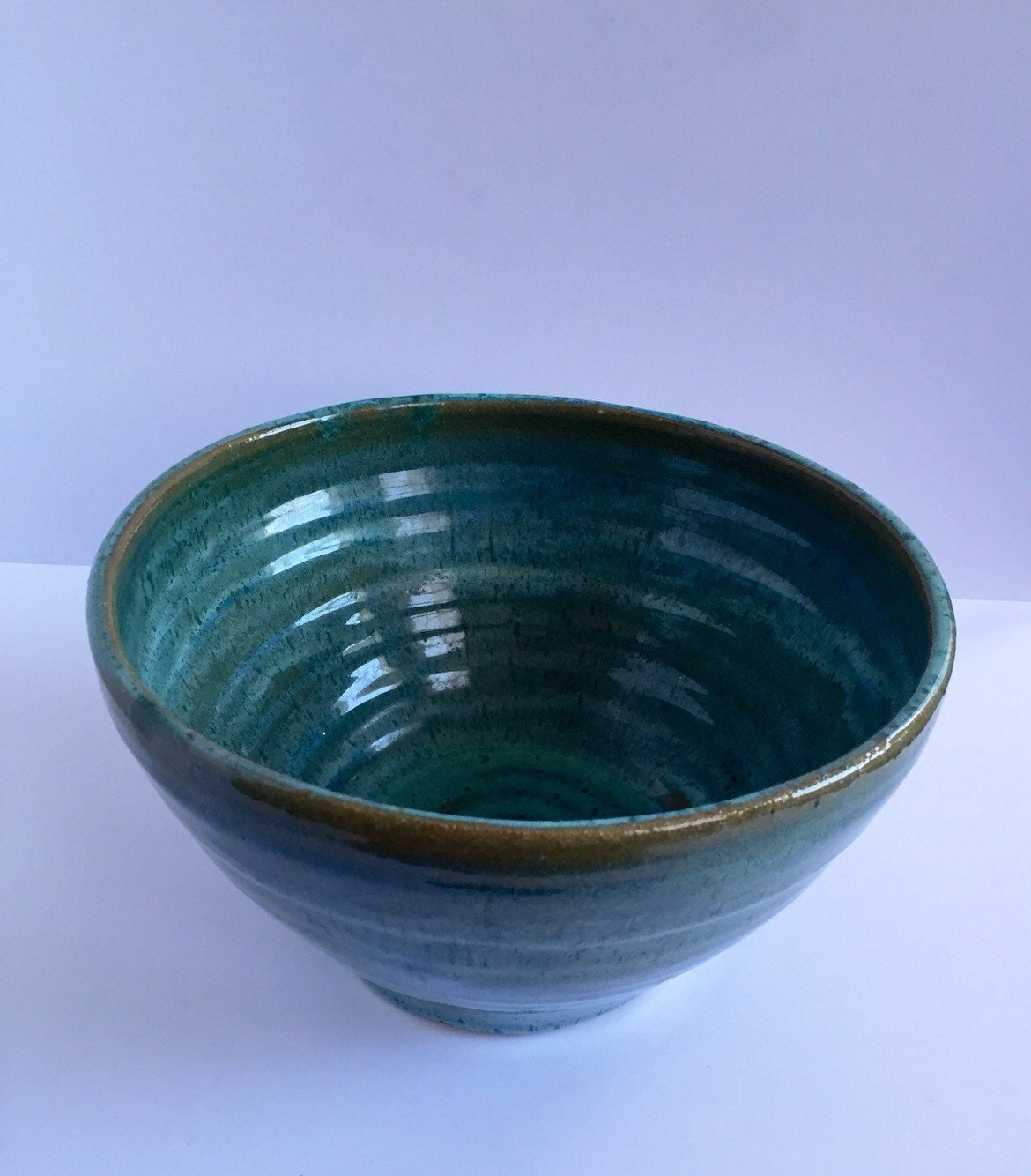 Large ceramic serving bowl in Turqiouse blue.