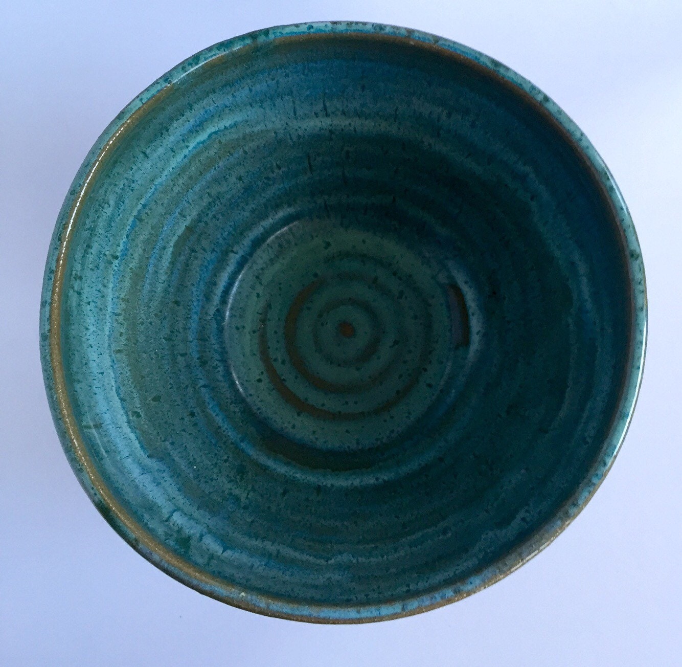 Large ceramic serving bowl in Turqiouse blue.