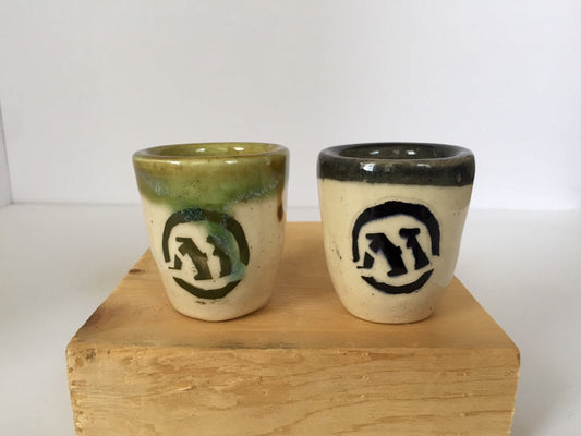 magic the gathering themed ceramic shot glasses.