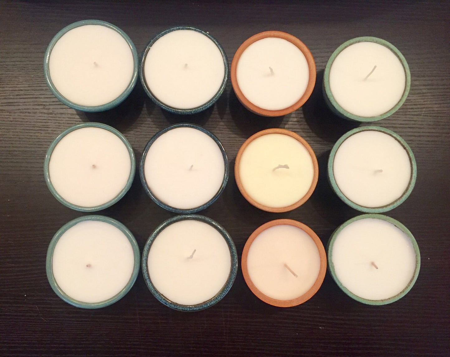 Vanilla scented candles in handmade ceramic jar